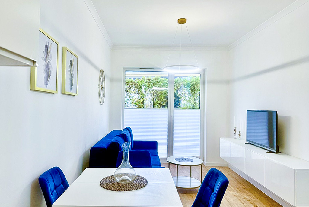 jadalnia i pokój dzienny w luksusowym apartamencie do wynajmu Słupsk