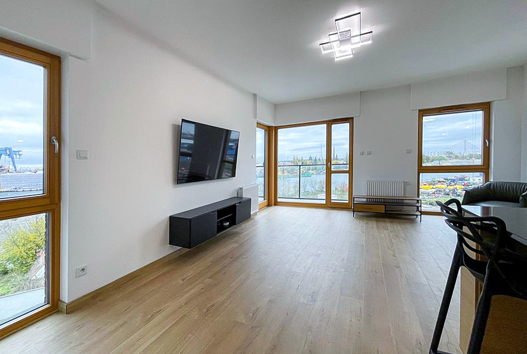 na zdjęciu pokój dzienny w luksusowym apartamencie na sprzedaż Gdańsk