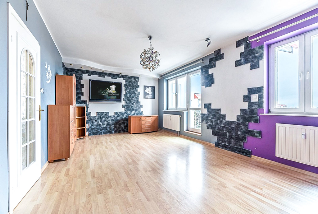 imponujący pokój dzienny w ekskluzywnym apartamencie do sprzedaży Gdynia okolice