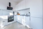 fragment kuchni w luksusowym apartamencie do wynajmu Elbląg