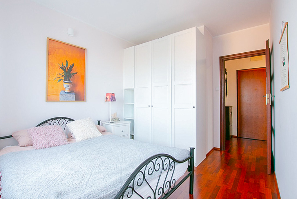 zaciszna sypialnia w ekskluzywnym apartamencie na wynajem Poznań