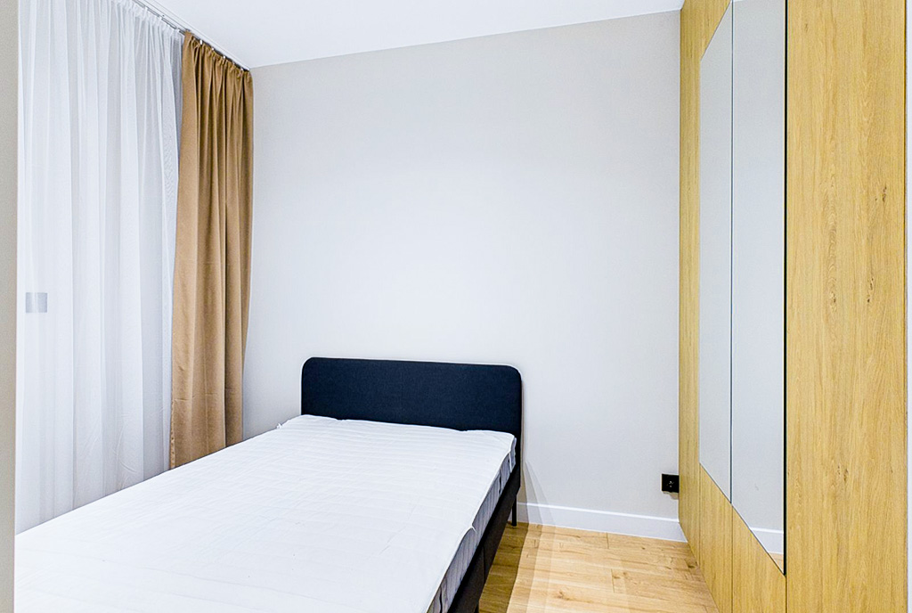 zaciszna sypialnia w ekskluzywnym apartamencie na sprzedaż Ostrów Wielkopolski