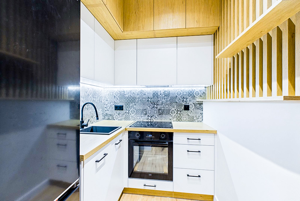 zbliżenie na aneks kuchenny w luksusowym apartamencie na sprzedaż Ostrów Wielkopolski