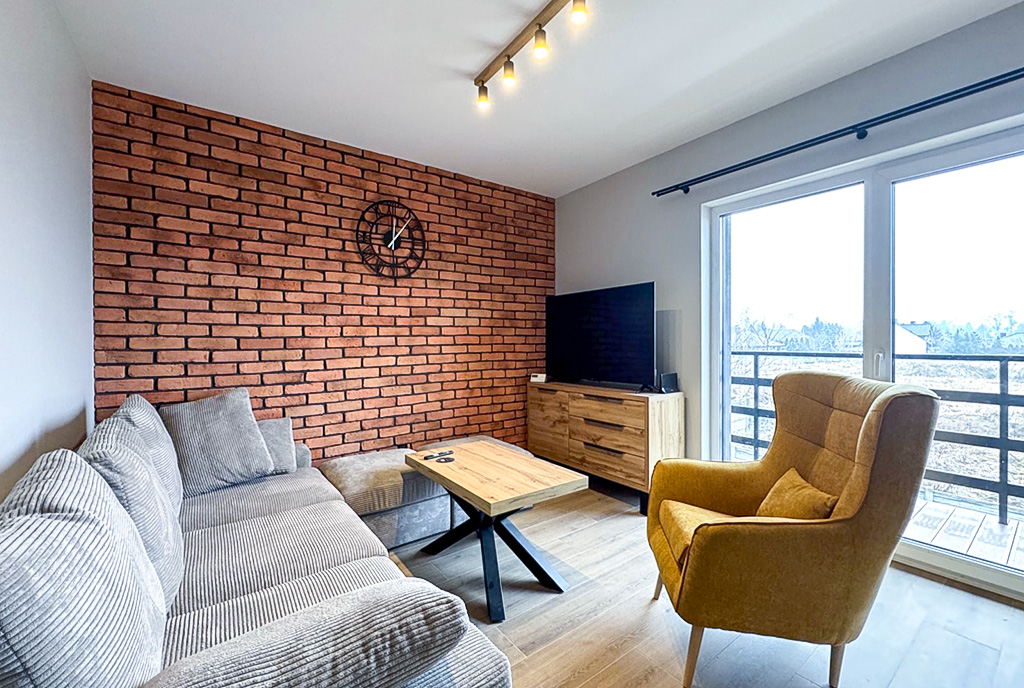 elegancki salon w ekskluzywnym apartamencie na wynajem Ostrów Wielkopolski