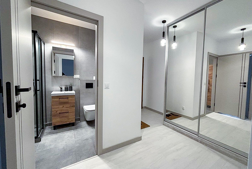 przestronny przedpokój w ekskluzywnym apartamencie na wynajem Szczecin