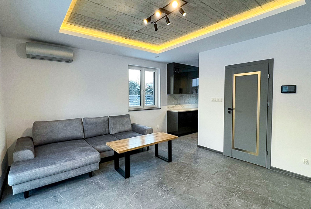 zbliżenie na pokój dzienny w luksusowym apartamencie do wynajmu Kraków okolice