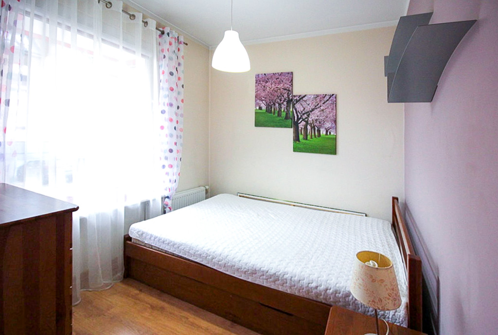 na zdjęciu sypialnia w ekskluzywnym apartamencie na sprzedaż Szczecin okolice