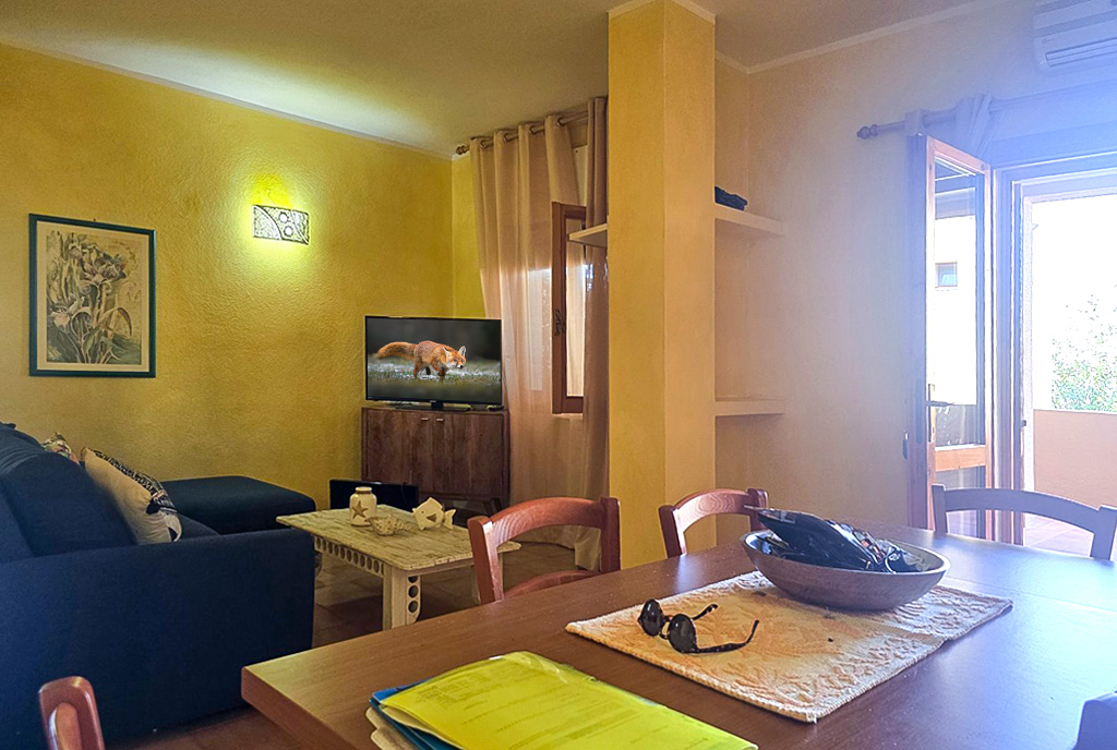 fragment pokoju dziennego w ekskluzywnym apartamencie do sprzedaży Włochy Lu Bagnu