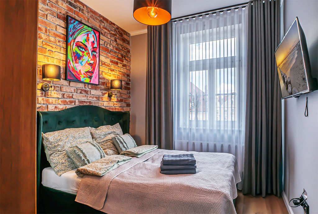 zaciszna sypialnia w ekskluzywnym apartamencie na wynajem