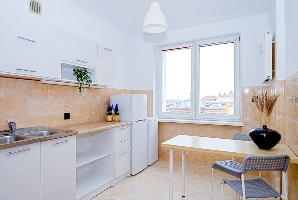 imponująca kuchnia w luksusowym apartamencie do wynajmu Poznań