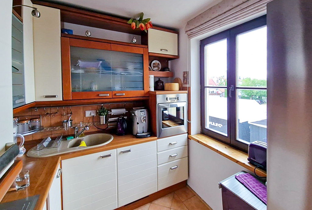zbliżenie na kuchnię w luksusowym apartamencie na sprzedaż Mazury