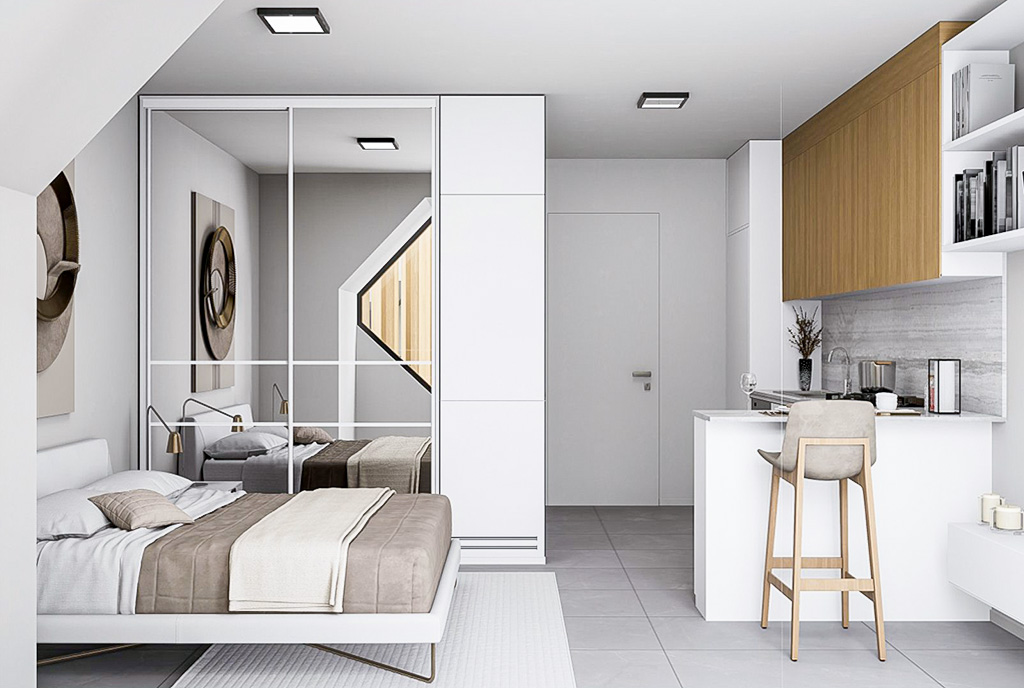 po lewej sypialnia, po prawej aneks kuchenny w ekskluzywnym apartamencie na sprzedaż Cypr Iskele Yeni