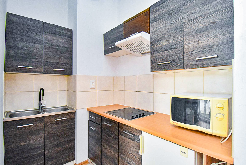 zbliżenie na aneks kuchenny w luksusowym apartamencie na sprzedaż Gdynia okolice