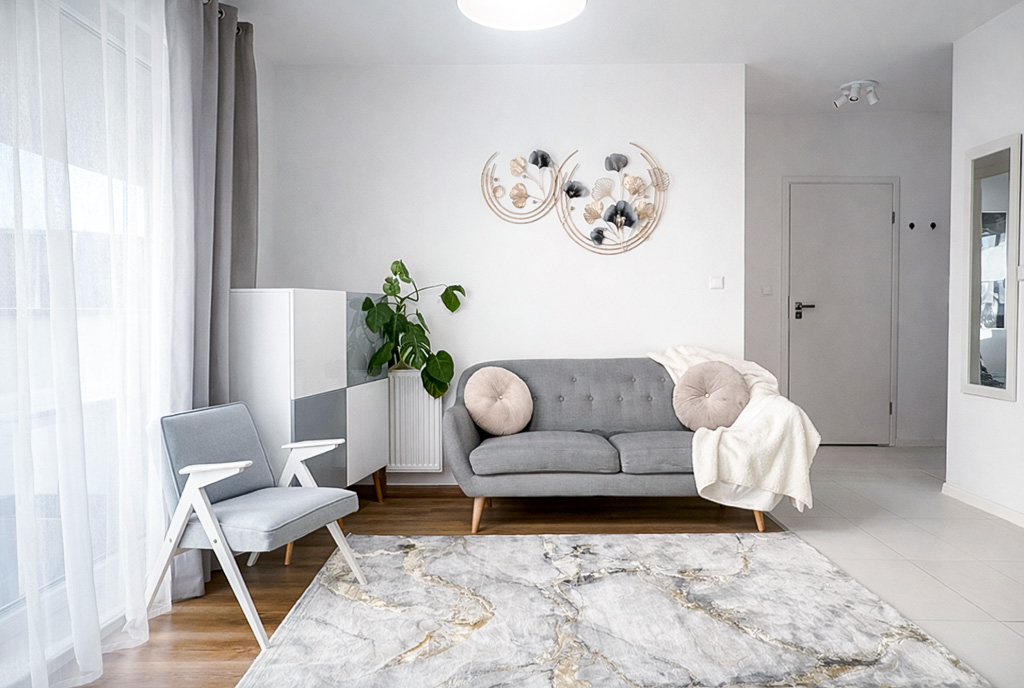 zbliżenie na pokój dzienny w luksusowym apartamencie na sprzedaż Gdynia okolice