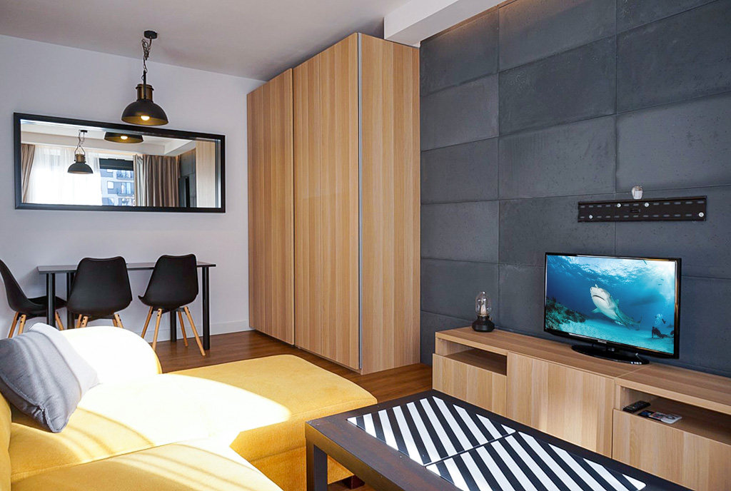 nowoczesny pokój gościnny w ekskluzywnym apartamencie do sprzedaży Wrocław