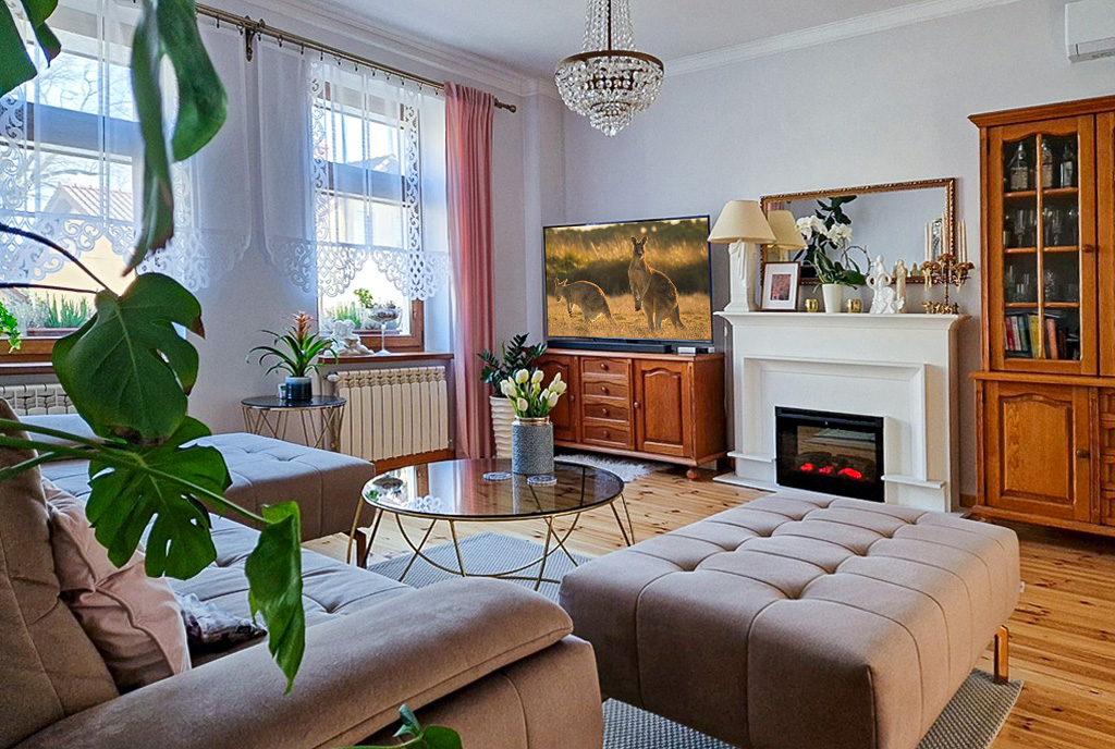 dystyngowany salon z kominkiem w ekskluzywnym apartamencie do sprzedaży Zielona Góra okolice