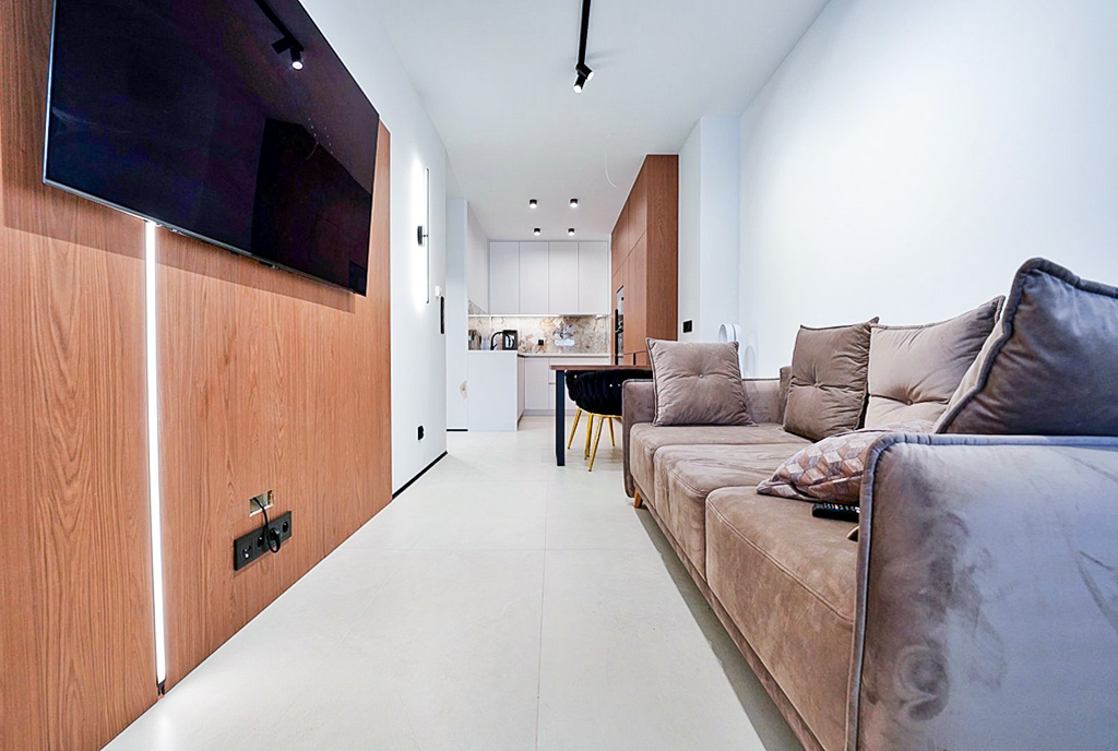 zaprojektowany zgodnie z najnowszymi trendami salon w luksusowym apartamencie na sprzedaż Gorzów Wielkopolski