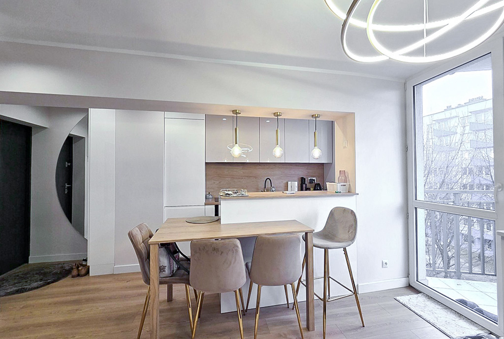 widok z salonu na aneks kuchenny w luksusowym apartamencie na sprzedaż Katowice