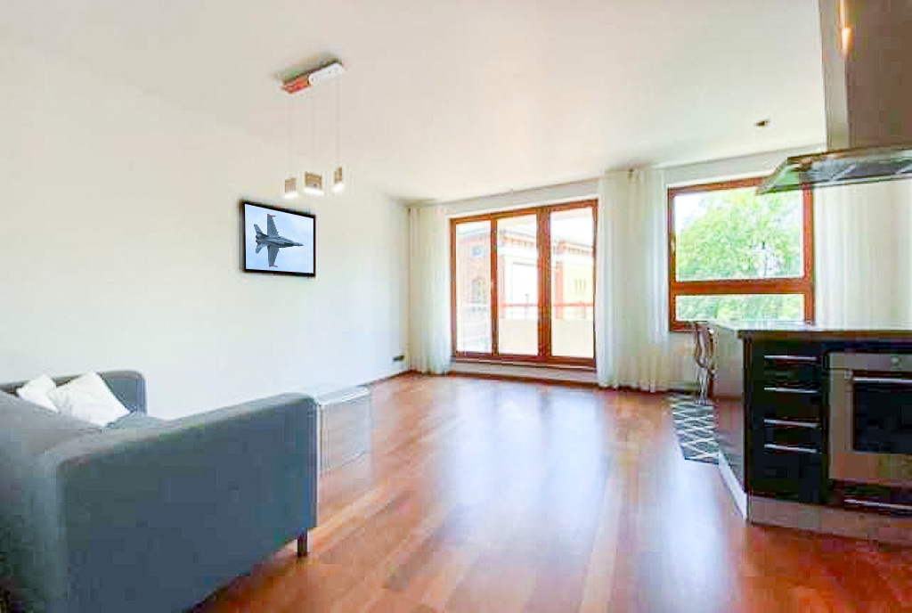 słoneczny salon w ekskluzywnym apartamencie do wynajęcia Szczecin