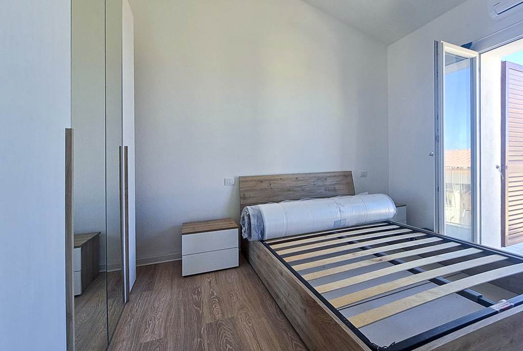 komfortowa sypialnia w luksusowym domu na sprzedaż Włochy Trinita