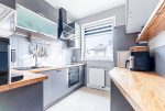 zabudowana kuchnia w luksusowym apartamencie na sprzedaż Gdynia okolice
