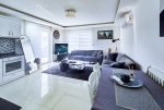nowoczesne wnętrze salonu w ekskluzywnym apartamencie do sprzedaży Turcja Alanya