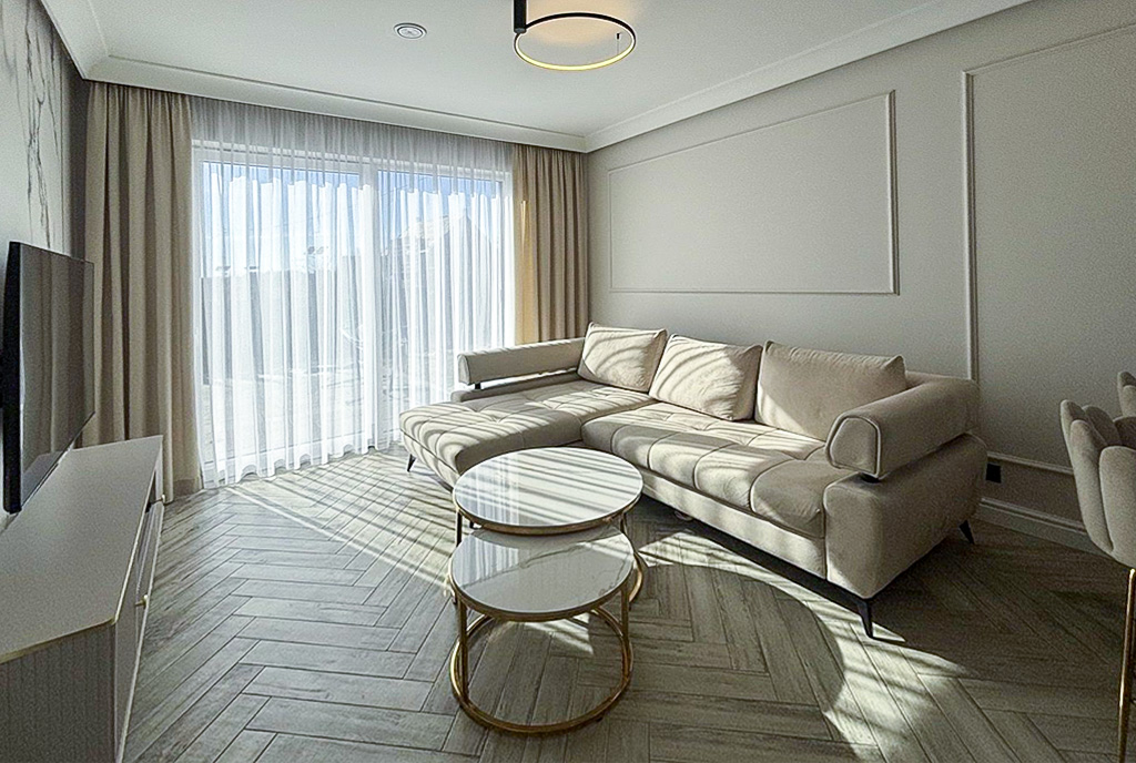 druga strona pokoju dziennego w luksusowym apartamencie do wynajmu Szczecin okolice