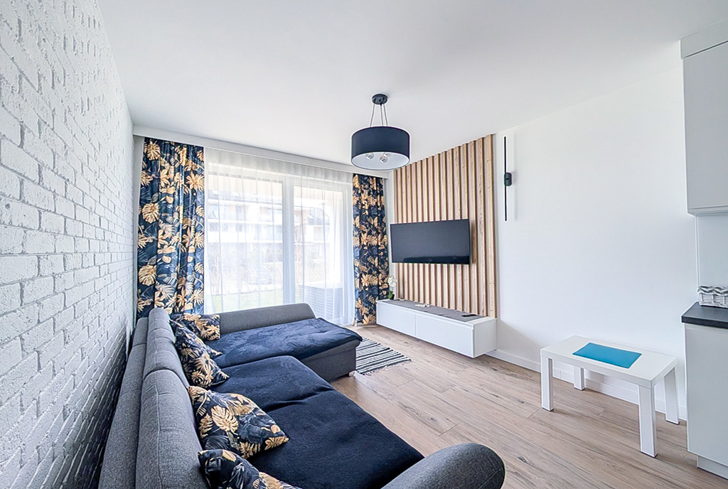 jeden z pokoi w ekskluzywnym apartamencie na sprzedaż Gdańsk (okolice)