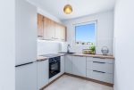 imponująca kuchnia w ekskluzywnym apartamencie na sprzedaż Gdynia okolice
