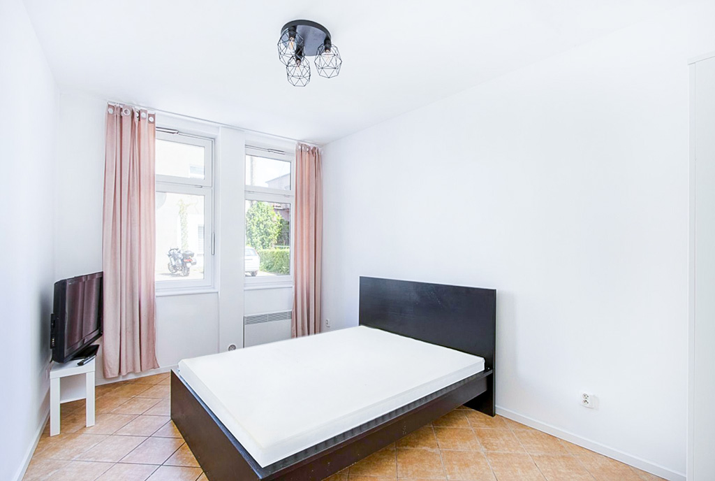 imponująca sypialnia w ekskluzywnym apartamencie na sprzedaż Poznań