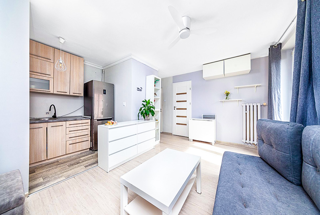widok na pokój dzienny w luksusowym apartamencie na sprzedaż Poznań