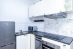 zbliżenie na aneks kuchenny w ekskluzywnym apartamencie na wynajem Szczecin