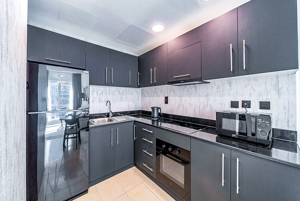 zabudowana kuchnia w ekskluzywnym apartamencie na sprzedaż Zjednoczone Emiraty Arabskie (Dubaj Marina)