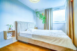 zaciszna sypialnia w ekskluzywnym apartamencie na sprzedaż Gdańsk