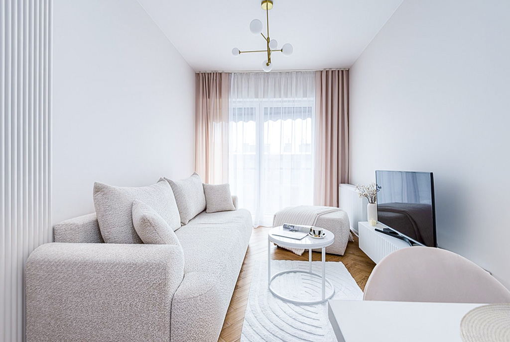 Widok na pokój dzienny w luksusowym apartamencie na sprzedaż Katowice (okolice)