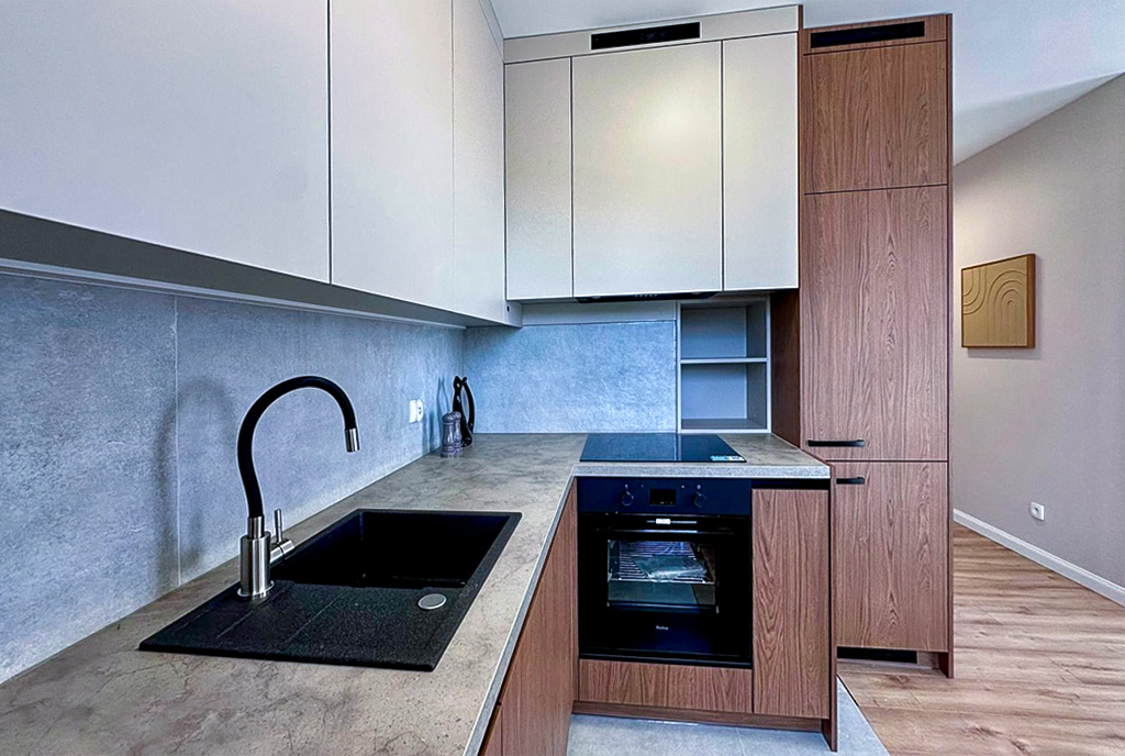 Zbliżenie na aneks kuchenny w ekskluzywnym apartamencie do sprzedaży Mielec.