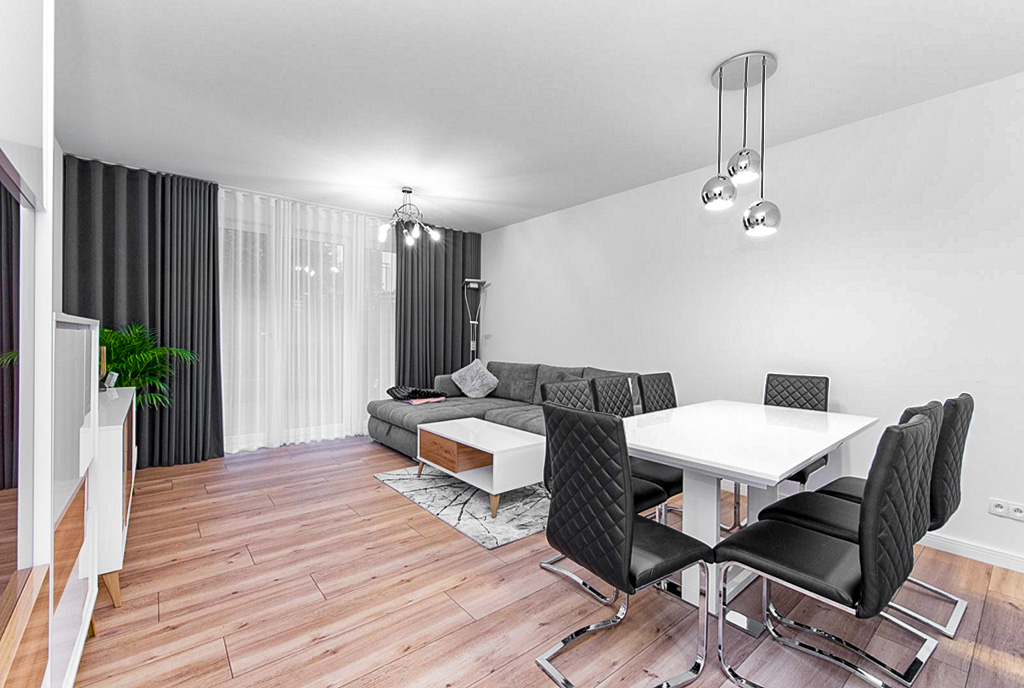 Wykończone w czerni i bieli wnętrza ekskluzywnego apartamentu do wynajęcia Gdynia okolice
