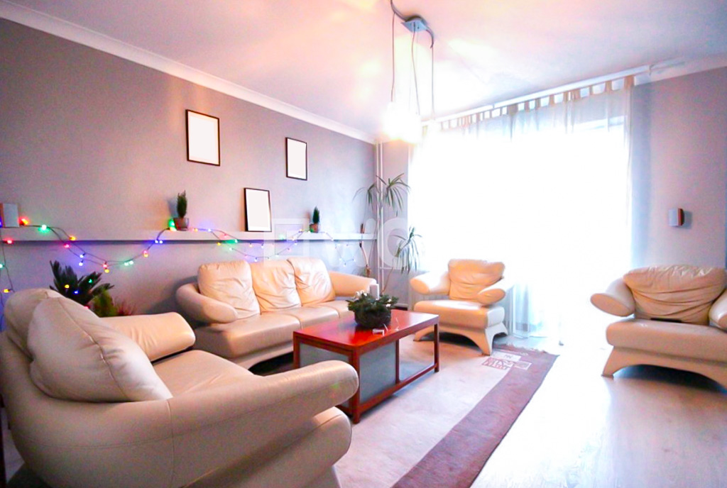 Druga strona salonu w ekskluzywnym apartamencie na wynajem Szczecin