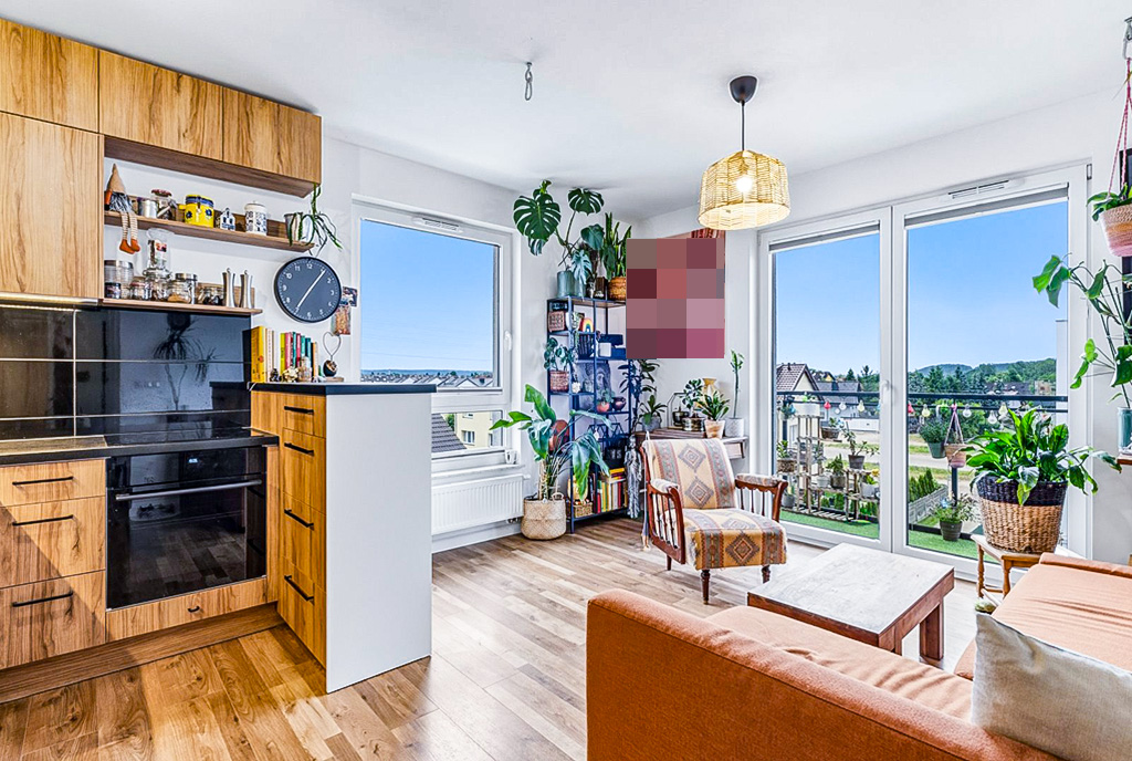 Słoneczny pokój dzienny w ekskluzywnym apartamencie na sprzedaż Gdynia okolice