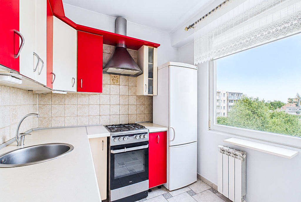 Zbliżenie na kuchnię ekskluzywnym apartamencie do sprzedaży Ostrów Wielkopolski