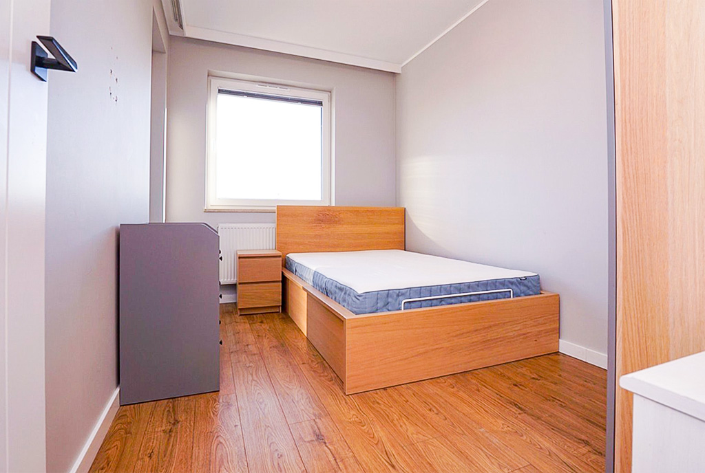 Fragment sypialni w ekskluzywnym apartamencie do sprzedaży Piotrków Trybunalski