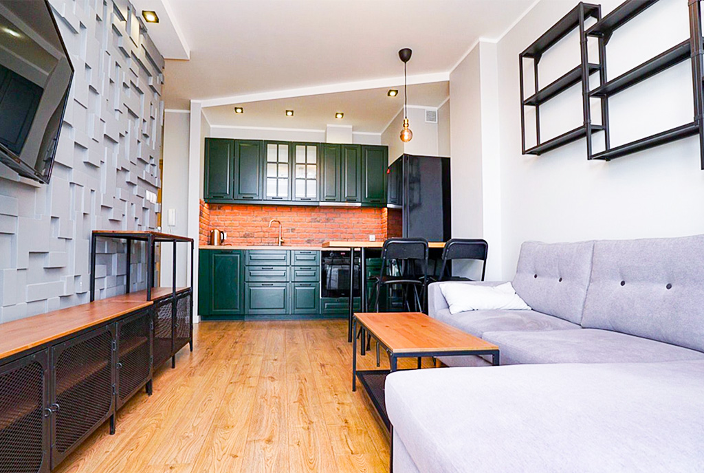 Komfortowa kuchnia w luksusowym apartamencie na sprzedaż Piotrków Trybunalski