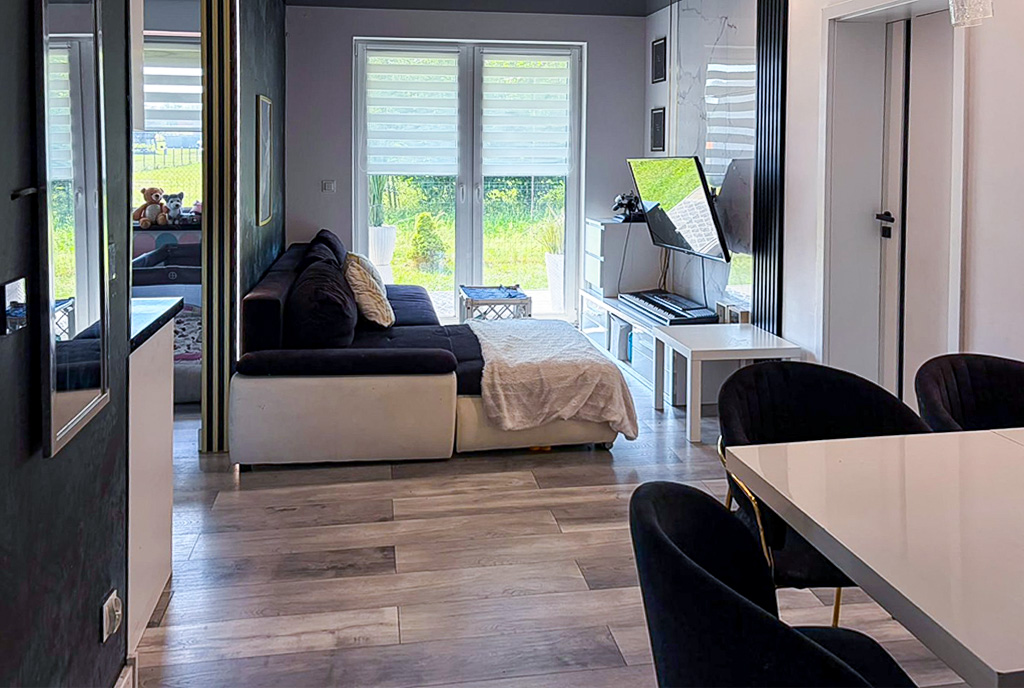 Nowoczesna aranżacja salonów, w ekskluzywnym apartamencie do sprzedaży Katowice okolice.