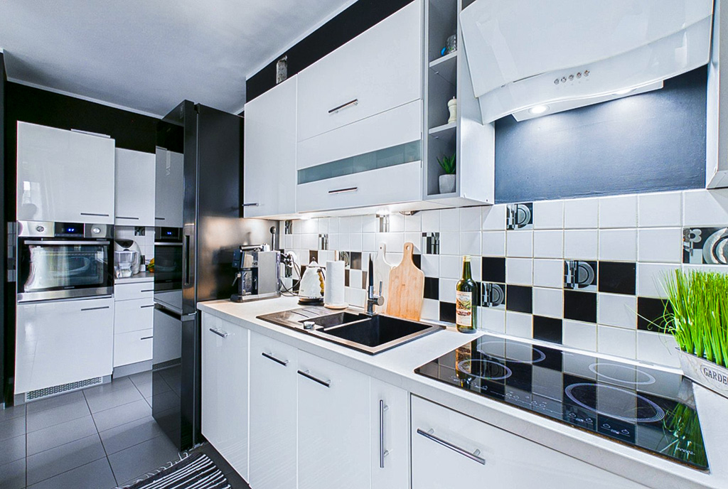 zbliżenie na kuchnię w luksusowym apartamencie na sprzedaż Ostrów Wielkopolski
