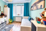 jeden z pokoi w luksusowym apartamencie na sprzedaż Kalisz