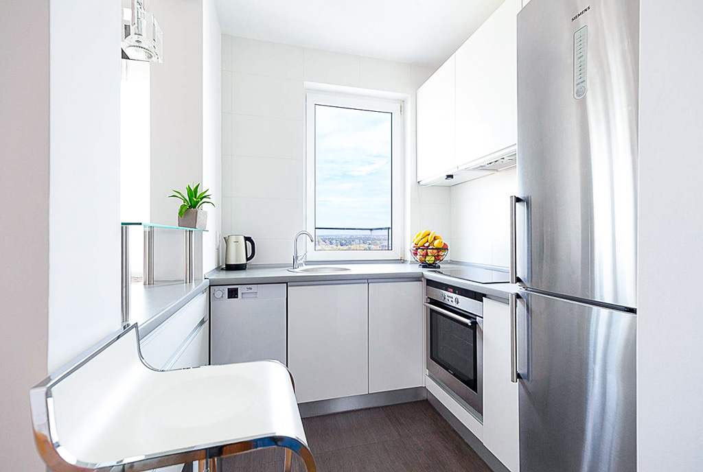 kompaktowa kuchnia w ekskluzywnym apartamencie na wynajem Poznań