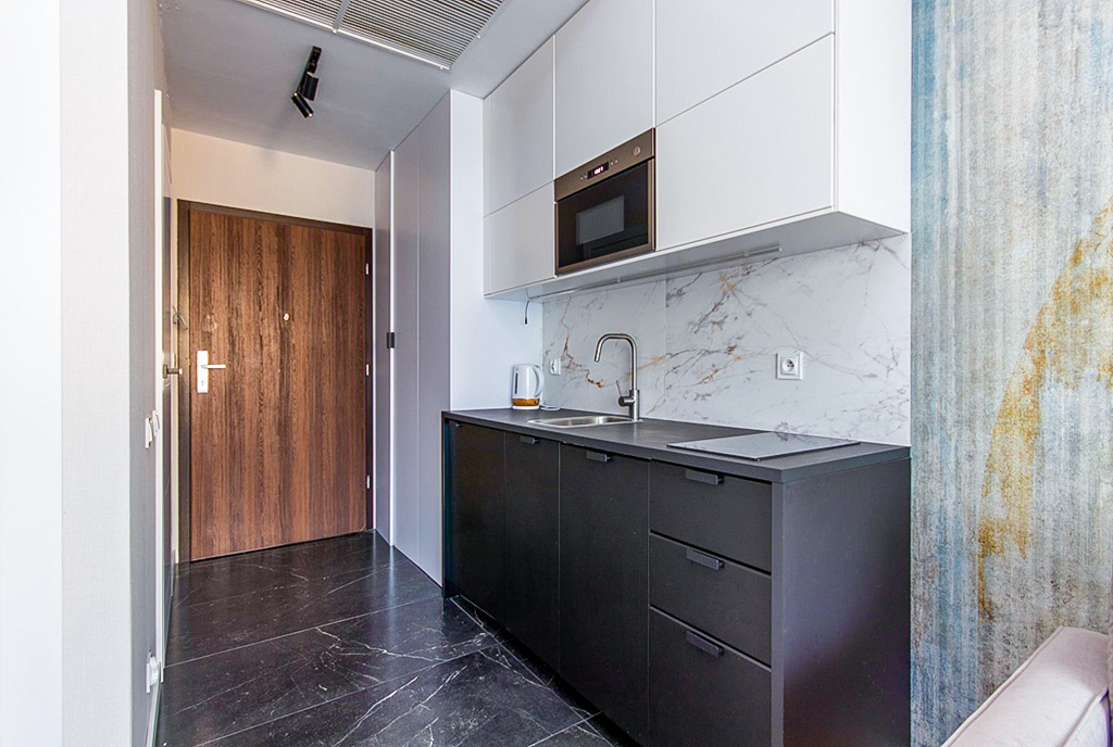 hol i kuchnia w ekskluzywnym apartamencie do sprzedaży Szczecin